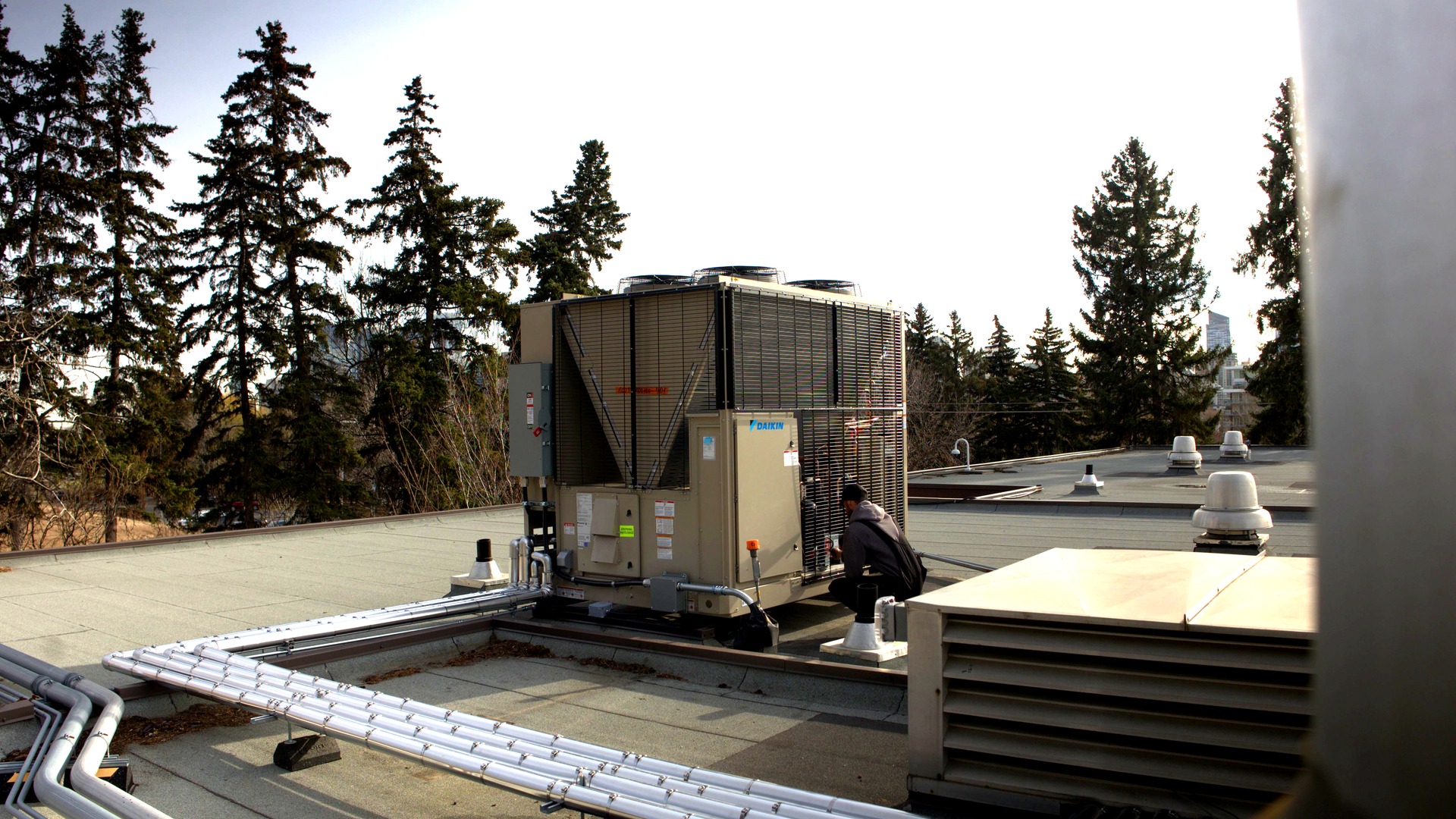 Arctic Air technician on rooftop